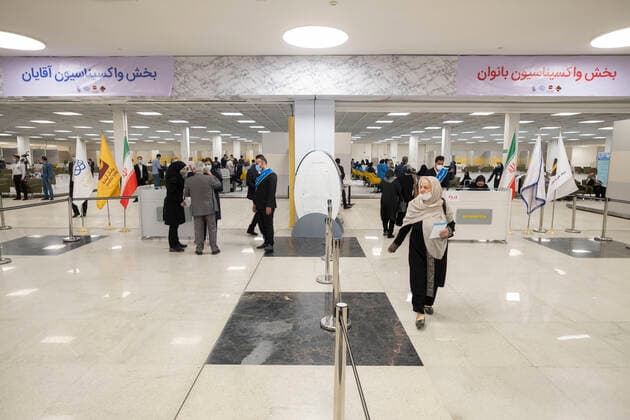Day-3 Of Mass General COVID-19 Vaccination In The Iran Grand Bazaar, Iran Mall, In Western Tehran An Iranian elderly woman (R) wearing a protective face mask leaves the main vaccination hall after receiving a dose of the China s Sinopharm new coronavirus disease (COVID-19) vaccine on day-3 of the mass general COVID-19 vaccination in the Iran Grand Bazaar (Market), Iran Mall, in western Tehran on May 17, 2021. Tehran Tehran Iran nikoubazl-day3ofma210517_npr82  Copyright: xMortezaxNikoubazlx