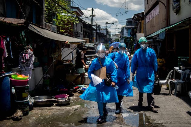 Vaccination Of Bedridden And Senior Citizens In Manila, Philippines Health workers in personal protective equipment (PPE) walk along a residential area during a house to house vaccination of bedridden and senior citizens against COVID-19, in Manila, Philippines, on May 17, 2021. Manila Metro Manila Philippines david-vaccinat210517_npr82  Copyright: xLisaxMariexDavidx
