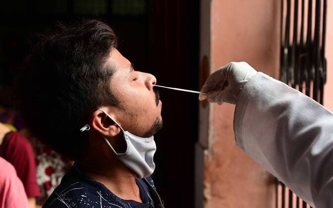 May 17, 2021, Prayagraj, Uttar Pradesh, India: Prayagraj: A medical worker take swab sample for RT-PCR test at Bahariya villageÃ¢â‚¬â ¢s Common Health Centre in Prayagraj on Monday, May 17, 2021. Prayagraj India - ZUMAv115 20210517_zap_v115_013 Copyright: xPrabhatxKumarxVermax