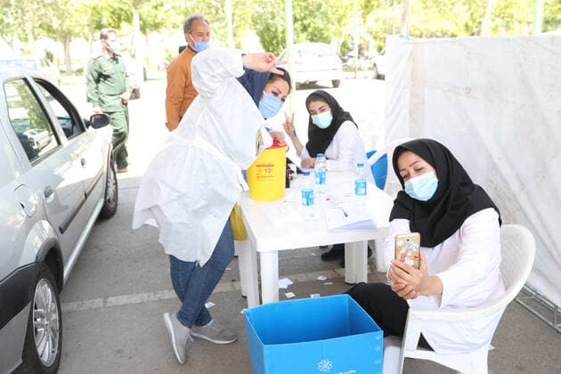 May 16, 2021, Munich, Bavaria, Germany: TEHRAN, IRAN - MAY, 16: A person receives a dose of Covid-19 vaccine at a drive-thru vaccination in iran on May 16, 2021 in Tehran, Iran. Munich Germany - ZUMAa283 20210516_zna_a283_020 Copyright: xMohammadrezaxAbbasix