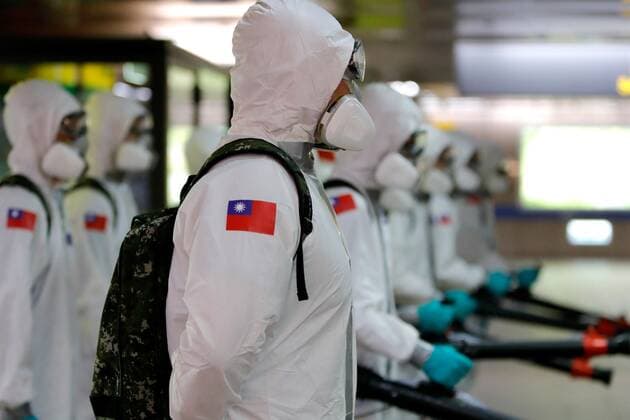 May 18, 2021, Taipei, Taipei, Taiwan: Military officers wearing personal protective equipment disinfect a major subway station in Taipei, as Taiwan has seen a dramatic increase in the number of locally acquired cases. The capital and New Taipei, where domestic cases were largely reported, have imposed stricter restrictions including suspending large scale activities, asking people to wear a mask outdoor, and forcing non essential businesses to close for curbing the spread of the coronavirus. Taipei Taiwan - ZUMAs313 20210518_zip_s313_011 Copyright: xDanielxCengxShou-Yix