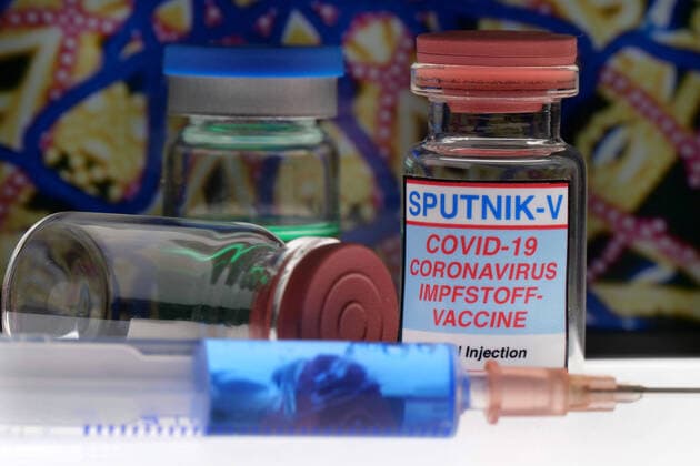 Symbol image Coronaserum vaccine can with syringe Corona vaccine