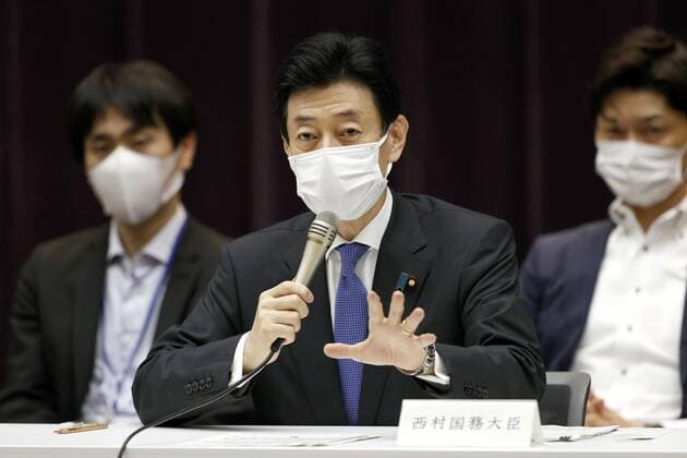 Japan set to place Okinawa under COVID-19 state of emergency Yasutoshi Nishimura, the minister in charge of the coronavirus response, speaks at a government subcommittee meeting in Tokyo s Nagatacho area on May 21, 2021. The Japanese government is set to decide later in the day to add Okinawa to areas under a COVID-19 state of emergency as infections in the southern island prefecture surge. 