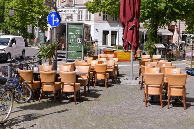 Berlin, Germany 21 May 2021 In Berlin, outdoor restaurants are allowed to reopen after the lockdown to fight the Corona pandemic In the picture The Indian restaurant in Maassenstrasse is getting ready and has put out chairs and tables Berlin Copyright: xFotostandx xReuhlx