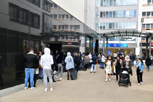 Retail shoppers stand in long queues outside Primark in Saarbrückens Bahnhofstrasse waiting to be let in on Friday 21 5 2021 bub