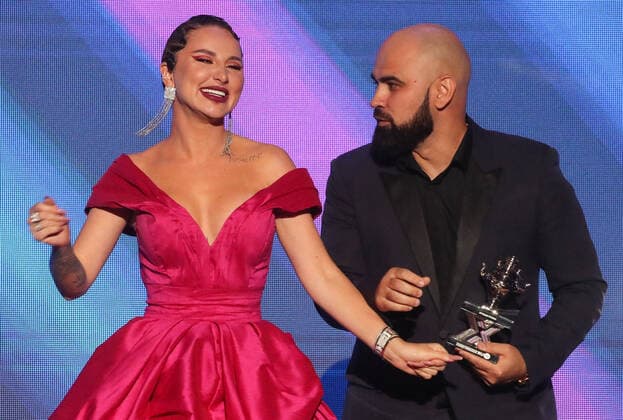 KRASNOGORSK, MOSCOW REGION, RUSSIA - MAY 22, 2021: Singers Artem Umrikhin and Anna Dzyuba of the pop band Artik & Asti, the winners of the Best Band prize, attend the 10th RU.TV Channel music award ceremony at Crocus City Hall. Sergei Karpukhin TASS  TS101002