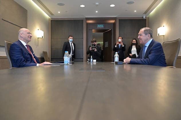 SOCHI, RUSSIA - MAY 24, 2021: Russia s Foreign Minister Sergei Lavrov (R) and Greece s Foreign Minister Nikos Dendias (L) talk during a meeting. Sergei Guneyev POOL TASS  TS1011D5