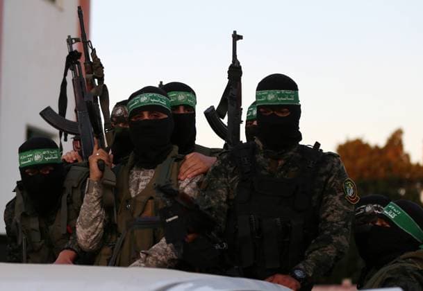 May 24, 2021, Khan Younis, Gaza Strip, Palestinian Territory: Members of the Izz al-Din al-Qassam Brigades, the military wing of Hamas movement, attend thier comrade s funeral who died in Israeli bombardment of a tunnel, in Khan Younis, southern Gaza Strip, on May 24, 2021. A ceasefire was reached late last week after 11 days of deadly violence between Israel and the Hamas movement Khan Younis Palestinian Territory - ZUMAap3_ 20210524_zaf_ap3_173 Copyright: xYasserxQudihx