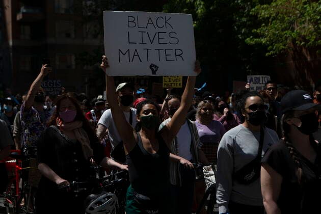 May 24, 2021, Toronto, on, Canada: Demonstrators march as they mark the first anniversary of the death of Regis Korchinski-Paquet, the 29-year-old African Indigenous woman who died in the presence of Toronto police officers, in Toronto on Monday, May 24, 2021. Toronto Canada  - ZUMAc35_ 20210524_zaf_c35_037 Copyright: xChrisxYoungx