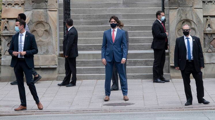 May 25, 2021, Ottawa, on, Canada: Prime Minister Justin Trudeau waits to cross the road as he walks to a news conference in Ottawa, Tuesday May 25, 2021. Ottawa Canada  - ZUMAc35_ 20210525_zaf_c35_011 Copyright: xAdrianxWyldx