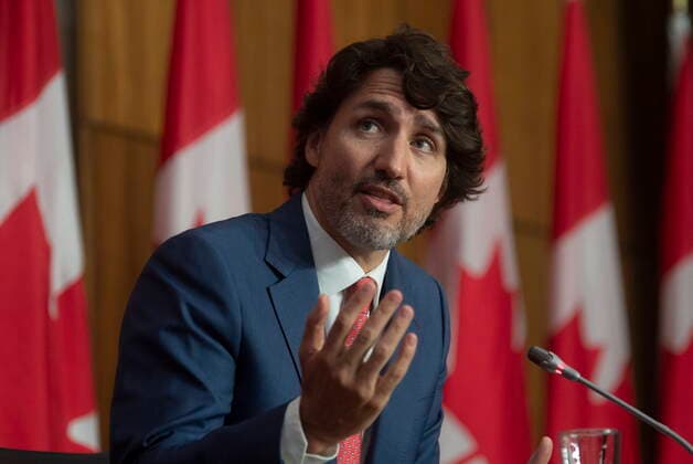 May 25, 2021, Ottawa, on, Canada: Prime Minister Justin Trudeau gestures to Public Services and Procurement Minister Anita Anand who appeared by video link during a news conference in Ottawa, Tuesday May 25, 2021. Ottawa Canada  - ZUMAc35_ 20210525_zaf_c35_013 Copyright: xAdrianxWyldx