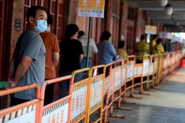 May 26, 2021, Taipei, Taipei, Taiwan: A bunch of people line up at a rapid Covid-19 testing centre in Taipei, following a spike in the number of domestic Covid-19 cases. Taiwan Center for Disease Control on Wednesday reported 304 new domestic cases, 331 adjusted cases, and 11 deaths while facing inadequate vaccines supply in the face of the ongoing community transmission. Taipei Taiwan - ZUMAs313 20210526_zip_s313_017 Copyright: xDanielxCengxShou-Yix