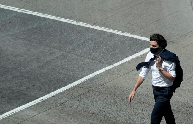 May 27, 2021, Ottawa, on, Canada: Prime Minister Justin Trudeau crosses a road as he walks to an announcement in Ottawa, Thursday, May 27, 2021. Ottawa Canada  - ZUMAc35_ 20210527_zaf_c35_036 Copyright: xAdrianxWyldx