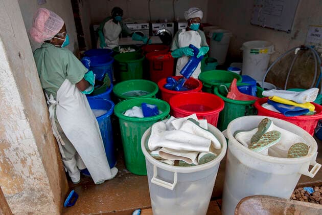 DRC, Democratic Republic of the Congo: Ebola treatment centre (ETC) in Butembo DRC, Democratic Republic of the Congo: Ebola treatment centre (ETC) in Butembo. Doctors and healthcare workers in the Ebola treatment centre run by the humanitarian medical aid organization Medecins Sans Frontieres, Doctors Without Borders. This tenth epidemic is the biggest ever recorded in DRC and is particularly worrying in the area of Butembo - Beni. Medical staff with protective clothing, full protective suits, masks, gloves and glasses. Former patients, survivors of the Ebola outbreak, are immunized and volunteers to assist the caregivers in the treatment centers. Butembo Nord kivu Africa; Central Africa; Democratic Republic of the Congo  Copyright: xCloarec Andia.frx 345315