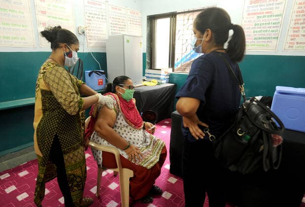 MUMBAI, INDIA - MAY 28: Limited number of beneficiaries in the above-45 age group get inoculated against Covid-19 due to online appointments at BMC School Vaccination Centre, in Hanuman Nagar, Kandivali East, on May 28, 2021 in Mumbai, India. (Photo by Vijay Bate Hindustan Times ) COVID-19 Vaccination Drive