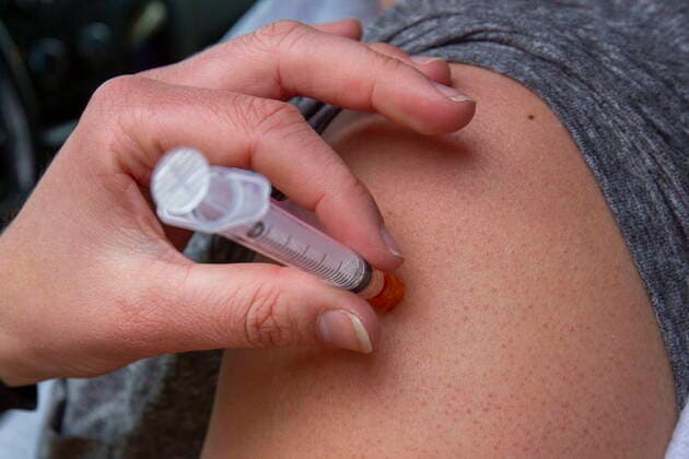 May 28, 2021, Kingston, Ontario, Canada: A person receives a COVID-19 vaccine at a drive-thru clinic at Richardson Stadium in Kingston, Ont., on Friday, May 28, 2021. Kingston Canada  - ZUMAc35_ 20210528_zaf_c35_040 Copyright: xLarsxHagbergx
