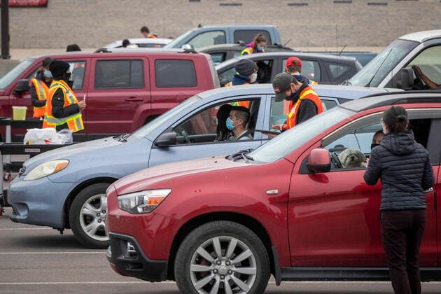 May 28, 2021, Kingston, Ontario, Canada: People sit in their vehicles while they wait to receive a COVID-19 vaccine at a drive-thru clinic at Richardson Stadium in Kingston, Ont., on Friday, May 28, 2021. Kingston Canada  - ZUMAc35_ 20210528_zaf_c35_043 Copyright: xLarsxHagbergx