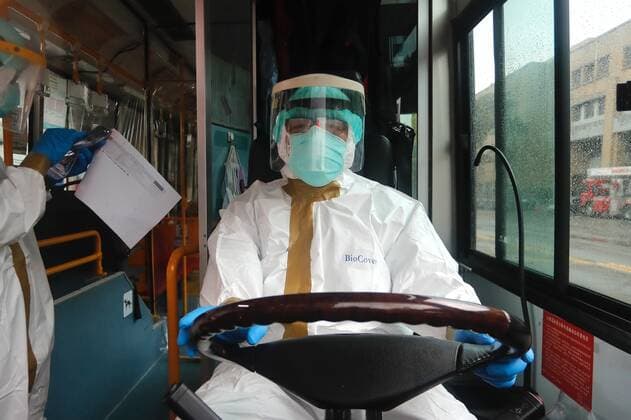 May 29, 2021, Taipei, Taipei, Taiwan: A special quarantine bus driver puts on a PPE at a fire station, where buses and taxis that carried quarantined persons are spread with disinfectant, before delivering citizens who have completed their quarantine, following a surge of domestic COVID-19 cases. The number of domestic COVID-19 cases particularly in Taipei has surged, with disinfection being intensified across the country to minimize transmission. Taipei Taiwan - ZUMAs313 20210529_zip_s313_023 Copyright: xDanielxCengxShou-Yix