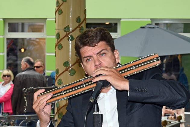 First of four parts of the event Hausmusikroas , with local folk musicians, on squares of the town of Gmunden, in the Upper Austrian Salzkammergut, as part of the Salzkammergut Festival Gmund