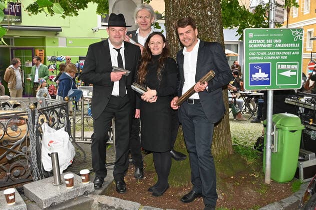 First of four parts of the event Hausmusikroas , with local folk musicians, on squares of the town of Gmunden, in the