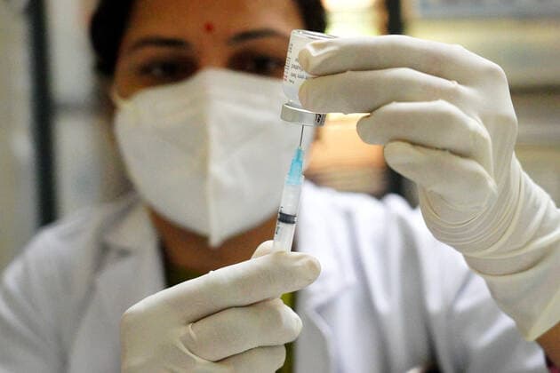 Virus Outbreak India Indian Health Worker Inoculates People With A Dose Of The Covid-19 Coronavirus Vaccine At A Vaccination Centre In Pushkar, Rajasthan, India On 30 May 2021. Pushkar Rajasthan India sharma-notitle210530_npZ2q  Copyright: xHimanshuxSharmax