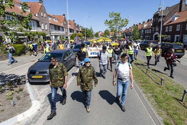 EINDHOVEN, Walk of Freedom Eindhoven, 30-05-2021. Nederland in Verzet has organised a Walk of Freedom through the city of Eindhoven. They are protesting against the corona measures and the current cabinet. Around 800 people participated in this march. A few veterans are protecting the March. Demonstratie tegen corona maatregelen en kabinet Walk of Freedom Eindhoven  x11988837x Copyright: