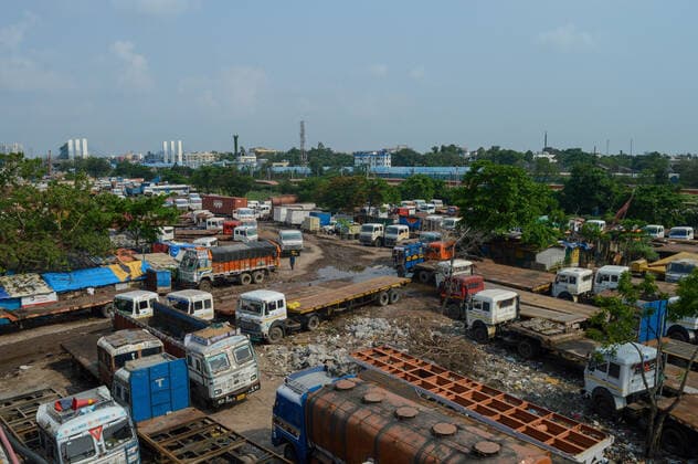 COVID-19 Lockdown In Kolkata Rows of parked truck is seen at an industrial area , during COVID-19 lockdown in Kolkata , India , on 30 May 2021 .West Bengal government has extended COVID-19 lockdown restrictions in the state till June 15 , to curb the spread of COVID-19 in the state . West Bengal has recorded over 11,000 cases yesterday , with India recording over 1.6 Lakh cases , its lowest daily cases record in 2 months according to Indian media report . Kolkata India chatterjee-notitle210530_npPkj  Copyright: xDebarchanxChatterjeex