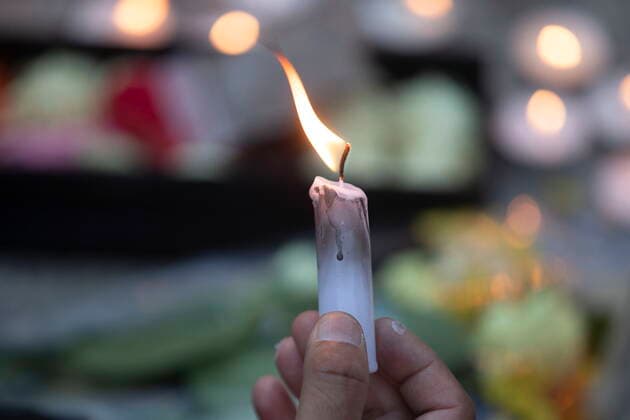 May 30, 2021, Toronto, on, Canada: Candles are lit during a vigil in Toronto on Sunday May 30, 2021, for the 215 Indigenous children, whose remains were uncovered on the grounds of a former residential school near Kamloops, British Columbia. The discovery of a mass grave was announced late on Thursday by the TkÃ¢â‚¬â ¢emlups te Secwo pemc people after the site was examined by a team using ground-penetrating radar. Toronto Canada  - ZUMAc35_ 20210530_zaf_c35_104 Copyright: xChrisxYoungx