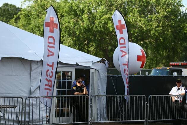 May 30, 2021, Tampa, Florida, USA: Police and fire and paramedics stand by the first aid tent during day two of the Sunset Music Festival weekend on Sunday, May 30, 2021 in Tampa. Sunset Music Festival returns to the parking lot of Raymond James Stadium after a one year hiatus during the COVID-19 pandemic shutdowns of 2020. Tampa USA - ZUMAs70_ 20210530_zan_s70_086 Copyright: xLuisxSantanax