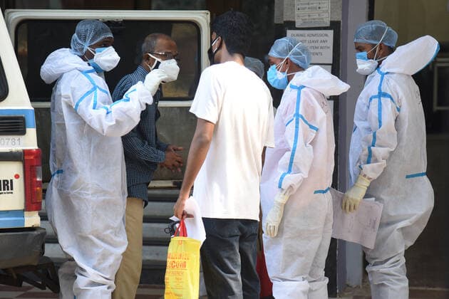 KOLKATA, INDIA - MAY 30: A Covid-19 patient is brought for treatment at Sambhunath Pandit Hospital, on May 30, 2021 in Kolkata, India. (Photo by Samir Jana Hindustan Times) Daily Life Amid Coronavirus Pandemic In India