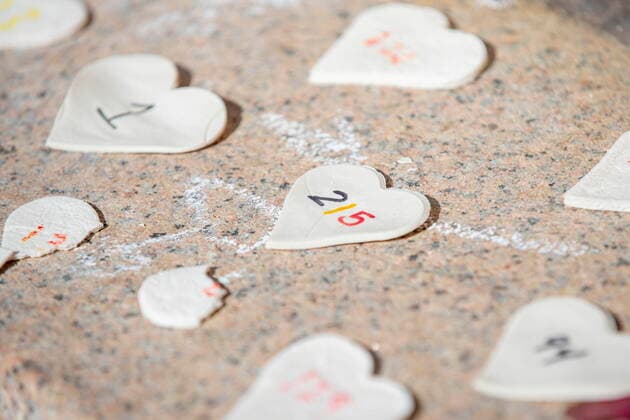 May 31, 2021, Kingston, Ontario, Canada: Numbered hearts are placed on the steps of the Sir John A. MacDonald statue in Kingston, Ont., on Monday, May 31, 2021. The hearts represent the 215 remains of children that were found on the grounds of a former residential school in Kamloops last week. Kingston Canada  - ZUMAc35_ 20210531_zaf_c35_025 Copyright: xLarsxHagbergx