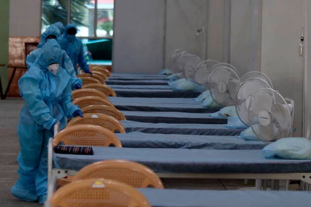 May 31, 2021, Chennai, Tamil Nadu, India: Health workers make the bed arrangement at a temporary isolation centre built in Chennai Trade Centre for the Covid-19 coronavirus patients in Chennai. Chennai India - ZUMA CEN 20210531_mda_l172_182 Copyright: xSrixLoganathanx