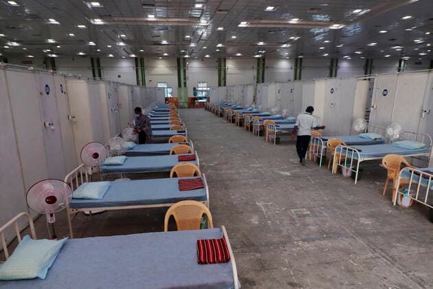 May 31, 2021, Chennai, Tamil Nadu, India: Workers make bed arrangement at a temporary isolation centre built in Chennai Trade Centre for the Covid-19 coronavirus patients in Chennai. Chennai India - ZUMA CEN 20210531_mda_l172_190 Copyright: xSrixLoganathanx
