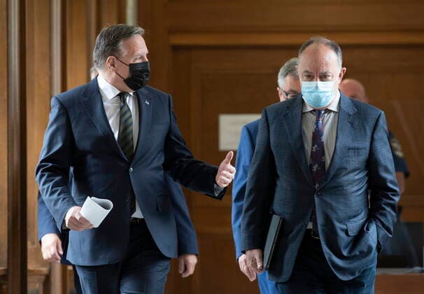 June 1, 2021, QUEBEC, PQ, Canada: Quebec Premier Francois Legault (left), chats with Quebec Health Minister Christian Dube as they walk to a news conference on the COVID-19 pandemic, Tuesday, June 1, 2021 at the legislature in Quebec City. QUEBEC Canada  - ZUMAc35_ 20210601_zaf_c35_041 Copyright: xJacquesxBoissinotx