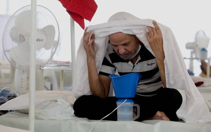 June 1, 2021, New Delhi, India: A Covid-19 suspected patient seen steaming him self at the covid-19 care center..All 38 Jewish people from Manipur (State in Northeastern India) supposed to leave for Israel but could not catch the flight after being detected Covid-19 positive..The Guru Teg Bahadur covid-19 Care Centre has 400 beds with all facility equipped with essential oxygen support and medicine for the patient at free of cost only for those with an oxygen saturation level of 85 and above can be admitted, set up by Delhi Sikh Gurudwara Management Committee (DSGMC) with the help from International Aid organizations and Delhi government. New Delhi India - ZUMAs197 20210601_zaa_s197_176 Copyright: xNaveenxSharmax