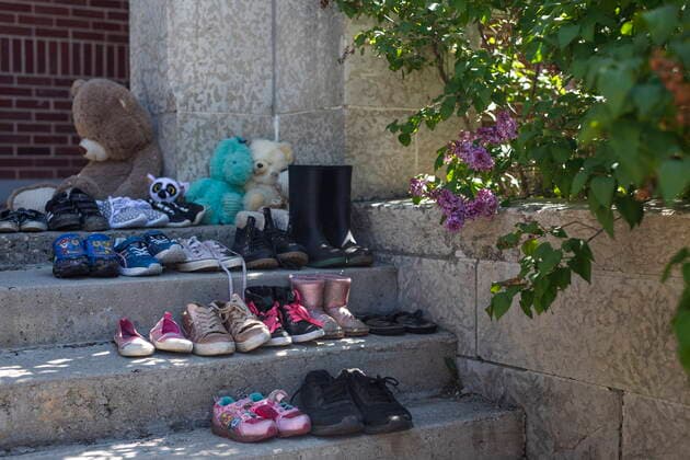 June 1, 2021, Muskowekwan First Nation, SK, Canada: Children s shoes sit on the front steps the former Muskowekwan Indian Residential School during a press conference and prayer vigil at Muscowequan Indian Residential School, one of the last residential schools to close its doors in Canada in 1997 and the last fully intact residential school still standing in Saskatchewan at Muskowekwan First Nation, Sask., on Tuesday, June 1, 2021. The vigil was in response to the remains of 215 children recently found at the Kamloops Indian Residential School. Muskowekwan First Nation Canada  - ZUMAc35_ 20210601_zaf_c35_078 Copyright: xKaylexNeisx