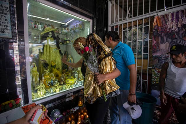 June 1, 2021, Mexico City, Mexico City, Mexico: A faithful holds a statue of Santa Muerte, while arriving at the Altar of Santa Muerte in the town of Tepito, as part of the celebrations that held on the first day of each month, hundreds of devotees attend to venerate it, give thanks for the favors and the fulfilled promises that this deity has granted them. La Santa Muerte or Santisima Muerte is a popular Mexican figure who personifies death and is an object of worship, the devotees of her are usually perceived as people associated with crime, gang activity, prostitution, drug trafficking. On June 1, 2021 in Mexico City, Mexico. Mexico City Mexico - ZUMAe321 20210601_zia_e321_013 Copyright: xRicardoxFloresx