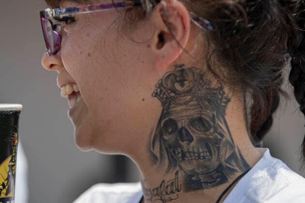 June 1, 2021, Mexico City, Mexico City, Mexico: A faithful with a tattoo of Santa Muerte, while arriving at the Altar of Santa Muerte in the town of Tepito, as part of the celebrations that held on the first day of each month, hundreds of devotees attend to venerate it, give thanks for the favors and the fulfilled promises that this deity has granted them. La Santa Muerte or Santisima Muerte is a popular Mexican figure who personifies death and is an object of worship, the devotees of her are usually perceived as people associated with crime, gang activity, prostitution, drug trafficking. On June 1, 2021 in Mexico City, Mexico. Mexico City Mexico - ZUMAe321 20210601_zia_e321_014 Copyright: xRicardoxFloresx