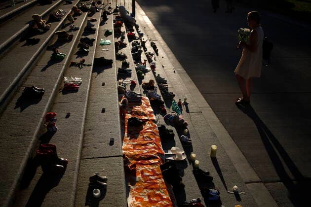 June 1, 2021, Victoria, BC, Canada: Shoes, teddy bears and messages are displayed on the steps outside the legislature in Victoria, Tuesday, June 1, 2021, in honour of the 215 residential school children whose remains have been discovered buried near the facility in Kamloops, B.C. Victoria Canada - ZUMAc35_ 20210601_zaf_c35_127 Copyright: xChadxHipolitox