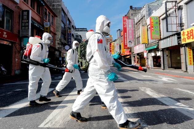 Virus Outbreak Taiwan Military officers with a PPE disinfect areas of Wanhua, Taipei, following a surge of domestic cases and deaths, in Taipei, Taiwan, 2 June 2021. The country has been facing a shortage of vaccines alongside the impact on its economy caused by the pandemic. Taipei Taiwan ceng-notitle210602_npcTn  Copyright: xCengxShouxYix