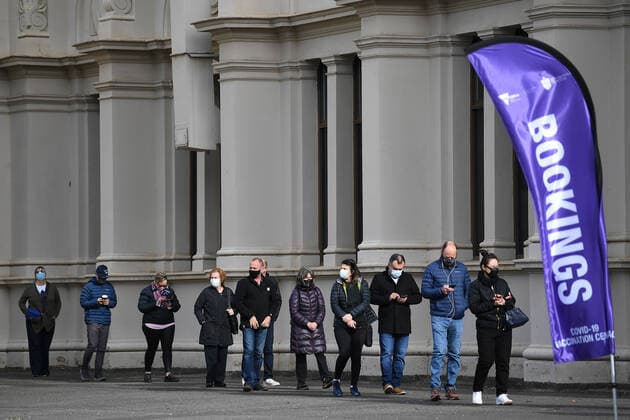 ANTI LOCKDOWN PROTEST MELBOURNE, People are seen in a line outside the Melbourne Exhibition Centre coronavirus vaccination hub as a Free Melbourne anti-lockdown protest is expected to take place in Melbourne, Saturday, June 5, 2021. ( NO ARCHIVING, EDITORIAL USE ONLY, NO USE IN BOOKS WITHOUT CONSENT MELBOURNE VIC AUSTRALIA  Copyright: xJAMESxROSSx 20210605001547484188
