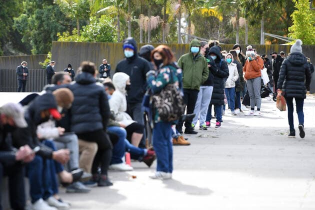 ANTI LOCKDOWN PROTEST MELBOURNE, People are seen in a line outside the Melbourne Exhibition Centre coronavirus vaccination hub as a Free Melbourne anti-lockdown protest is expected to take place in Melbourne, Saturday, June 5, 2021. ( NO ARCHIVING, EDITORIAL USE ONLY, NO USE IN BOOKS WITHOUT CONSENT MELBOURNE VIC AUSTRALIA  Copyright: xJAMESxROSSx 20210605001547485423