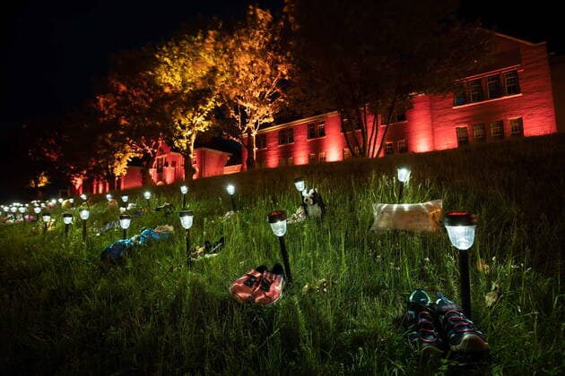 June 4, 2021, Kamloops, BC, Canada: Shoes are placed on the lawn outside the former Kamloops Indian Residential School to honour the 215 children whose remains have been discovered buried near the facility, in Kamloops, B.C., on Friday, June 4, 2021. Kamloops Canada  - ZUMAc35_ 20210604_zaf_c35_177 Copyright: xDarrylxDyckx