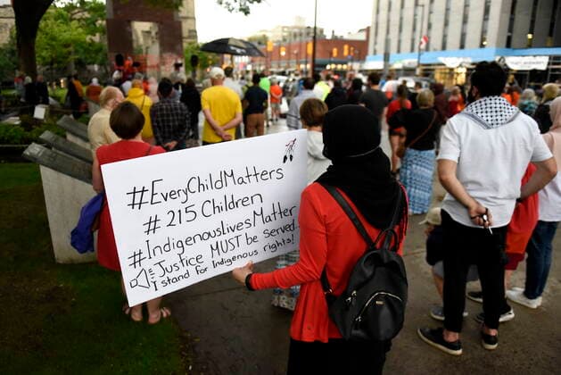 June 5, 2021, Ottawa, on, Canada: People attend a vigil held by Ottawa faith communities, to honour the 215 children whose remains were found at the grounds of the former Kamloops Indian Residential School at Tkâ€⠢emlups te Secwo pemc First Nation in Kamloops, B.C., at the Human Right s Monument in Ottawa, on Saturday, June 5, 2021. Ottawa Canada - ZUMAc35_ 20210605_zaf_c35_080 Copyright: xJustinxTangx