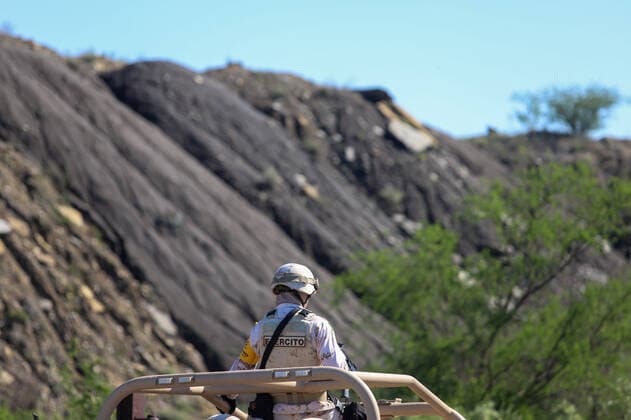 (210606) -- COAHUILA, June 6, 2021 -- A Mexican Army soldier stands guard at the site of the collapse of a mine in Rancherias of Muzquiz municipality, in Coahuila state, Mexico, on June 5, 2021. At least one person died after a mine flooded and then collapsed in the Mexican municipality of Muzquiz in the northern state of Coahuila, Mexico s National Civil Protection Coordination said on Saturday. The agency said on Twitter that six workers were still trapped in the mine. ) MEXICO-COAHUILA-MINE-COLLAPSE AlejandroxRodriguez 