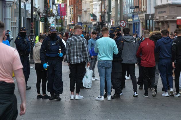 19 People Arrested For Public Order Offences In Dublin On Saturday Night Members of Gardai checking a group of young men and confiscate alcohol on Grafton Street in Dublin city center on Saturday evening, June 5, 2021. Nineteen people were arrested on suspicion of violating public order after another night of rioting in downtown Dublin. Glass bottles and other missiles were thrown at the gardai after they collided with large crowds in the city on Saturday night. On Sunday, 6 June 2021, in Dublin, Ireland. Dublin Ireland widak-19people210606_np4BQ  Copyright: xArturxWidakx
