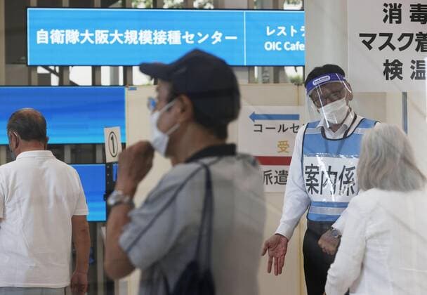 Mass vaccination center in Osaka People arrive at a mass coronavirus vaccination center in Osaka on June 7, 2021. 