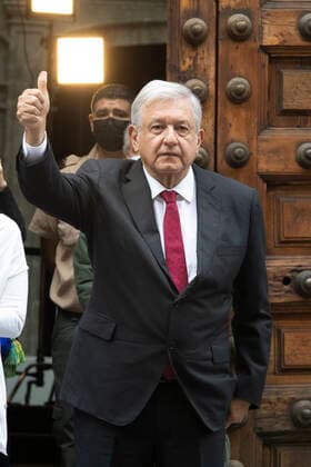 (210606) -- MEXICO CITY, June 6, 2021 -- Mexican President Andres Manuel Lopez Obrador (Front) shows his inked finger after casting his ballot during the mid-term elections in Mexico City, capital of Mexico, on June 6, 2021. Mexico began midterm elections on Sunday with the opening of about 161,000 polling stations throughout the country, with about 90 million people eligible to vote to fill more than 20,000 public positions. (Str Xinhua) MEXICO-MEXICO CITY-MID-TERM ELECTIONS Stringer 