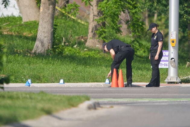 June 7, 2021, London, Ontario, Canada: London Police investigate the scene of a car crash in London, Ontario on Monday, June 7, 2021. Police in London, Ont., say four people have died after several pedestrians were struck by a car Sunday night. London Canada  - ZUMAc35_ 20210607_zaf_c35_016 Copyright: xGeoffxRobinsx