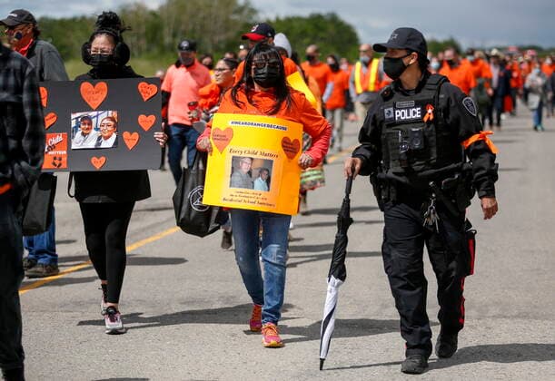 June 7, 2021, Calgary, ab, Canada: Members of the Tsuut ina Nation take part in a silent march in memory of the 215 unmarked graves found at Kamloops, B.C., in Calgary, Alta., Monday, June 7, 2021. Calgary Canada  - ZUMAc35_ 20210607_zaf_c35_038 Copyright: xJeffxMcintoshx